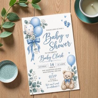 A personalised baby shower invitation with a blue and white theme, celebrating the upcoming arrival of a baby boy.