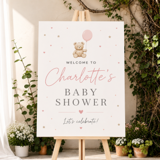personalised baby shower sign on an easel