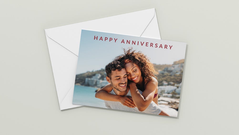A cheerful anniversary card featuring a vibrant photo and heartfelt message celebrating love and togetherness.